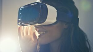 man wearing white virtual reality goggles